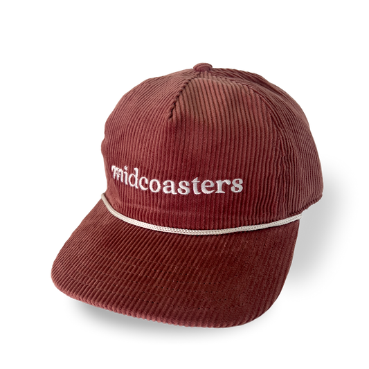 Dusty Rose corduroy cap with white embroidered 'midcoasters' text 